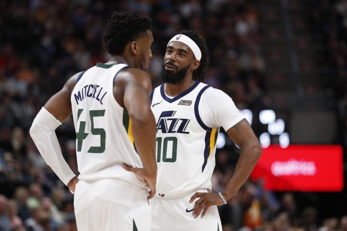 Donovan Mitchell (45) and Mike Conley (10) chat during a break in play